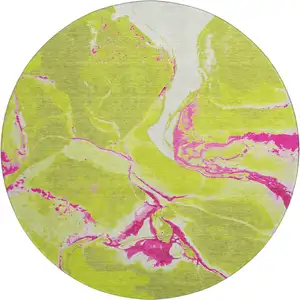Photo of 8' Lime Green Pink And Ivory Abstract Washable Round Rug With UV Protection