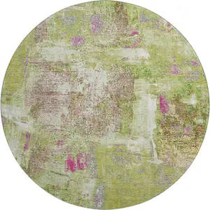 Photo of 8' Lime Green Pink And Yellow Abstract Washable Round Rug With UV Protection