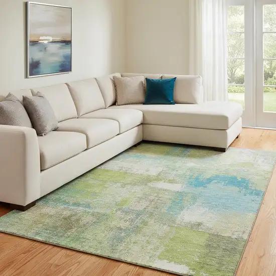 8' Lime Green Teal And Ivory Abstract Washable Area Rug With UV Protection Photo 2