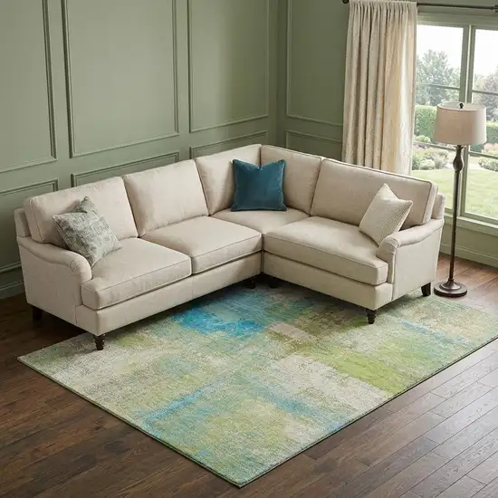 8' Lime Green Teal And Ivory Abstract Washable Area Rug With UV Protection Photo 1