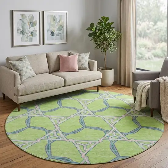 8' Lime Green Teal And Ivory Geometric Washable Round Rug With UV Protection Photo 1