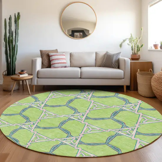 8' Lime Green Teal And Ivory Geometric Washable Round Rug With UV Protection Photo 4
