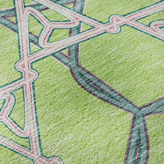 8' Lime Green Teal And Ivory Geometric Washable Round Rug With UV Protection Photo 8