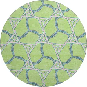 Photo of 8' Lime Green Teal And Ivory Geometric Washable Round Rug With UV Protection