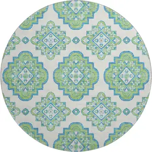 Photo of 8' Lime Green Teal And Ivory Medallion Washable Round Rug With UV Protection