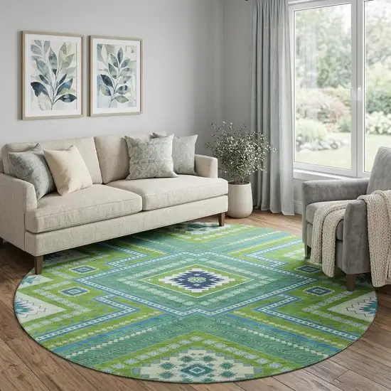 8' Lime Green Teal And Ivory Tribal Washable Round Rug With UV Protection Photo 1