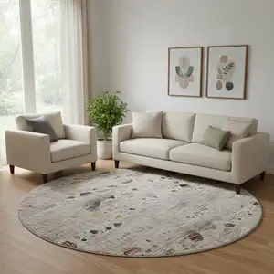 Photo of 8' Linen And Beige Abstract Washable Round Rug With UV Protection