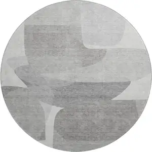 Photo of 8' Linen And Gray Abstract Washable Round Rug With UV Protection