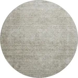 Photo of 8' Linen And Ivory Abstract Washable Round Rug With UV Protection