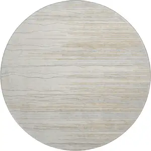 Photo of 8' Linen Beige And Ivory Striped Washable Round Rug With UV Protection