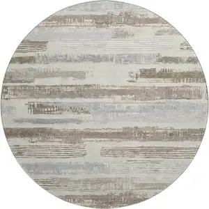Photo of 8' Linen Gray And Ivory Striped Washable Round Rug With UV Protection