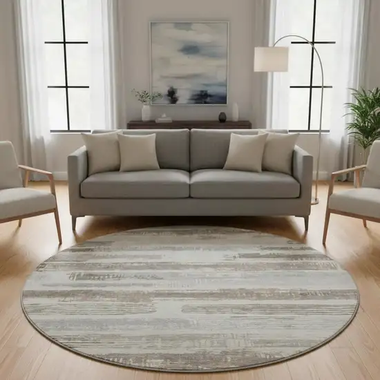 8' Linen Gray And Ivory Striped Washable Round Rug With UV Protection Photo 2