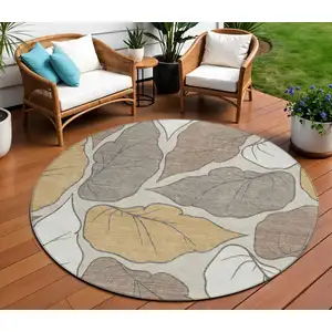 Photo of 8' Linen Ivory And Brown Round Botanical Leaves Washable Indoor Outdoor Area Rug