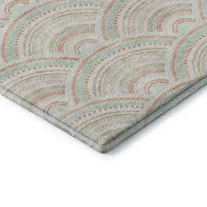 Photo of 8' Linen Peach And Ivory Geometric Washable Round Rug With UV Protection