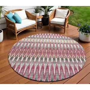 Photo of 8' Mauve Merlot And Ivory Round Southwestern Washable Indoor Outdoor Area Rug