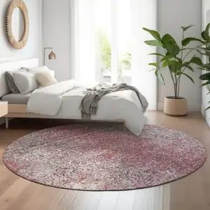 Photo of 8' Merlot And Gray Abstract Washable Round Rug With UV Protection
