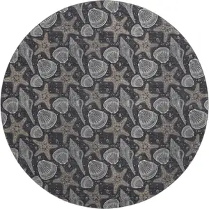 Photo of 8' Midnight And Taupe Geometric Washable Round Rug With UV Protection