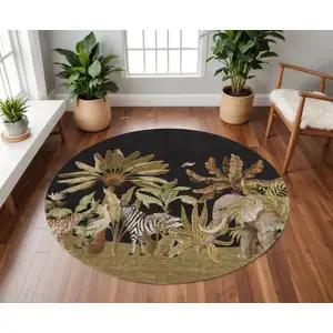 Photo of 8' Midnight Brown And Olive Green Geometric Washable Round Rug With UV Protection