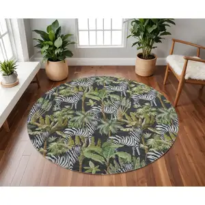 Photo of 8' Midnight Green And Brown Geometric Washable Round Rug With UV Protection