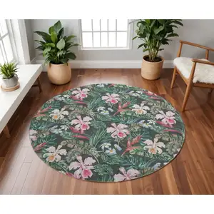 Photo of 8' Midnight Green And Pink Geometric Washable Round Rug With UV Protection