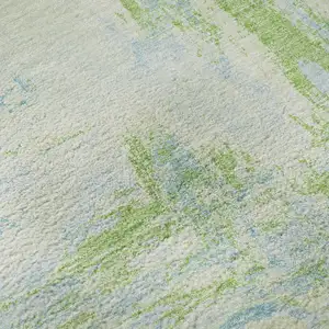 Photo of 8' Mint Green And Blue Abstract Washable Area Rug With UV Protection
