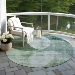 Photo of 8' Mint Green And Fern Green Round Geometric Washable Indoor Outdoor Area Rug