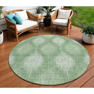 Photo of 8' Mint Green And Fern Green Round Ikat Washable Indoor Outdoor Area Rug