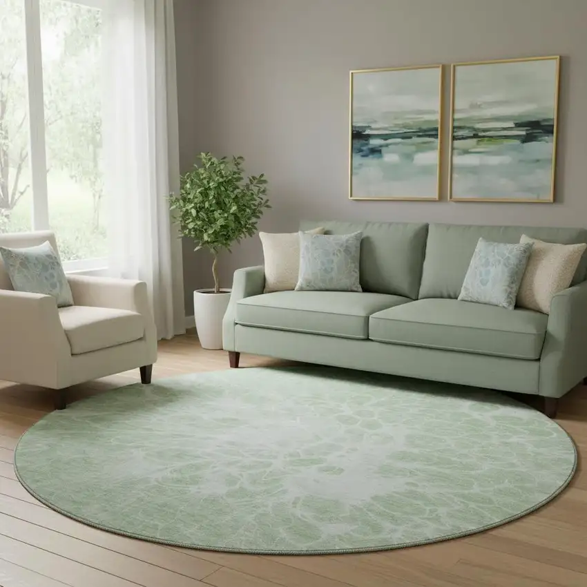 8' Mint Green And Ivory Abstract Washable Round Rug With UV Protection Photo 1