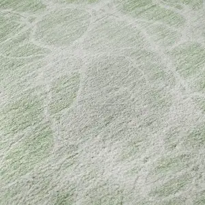 Photo of 8' Mint Green And Ivory Abstract Washable Round Rug With UV Protection