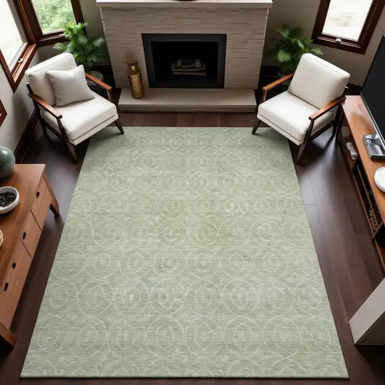 8' Mint Green And Ivory Geometric Washable Area Rug With UV Protection Photo 5