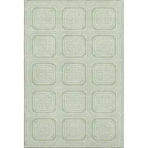 Photo of 8' Mint Green And Ivory Geometric Washable Area Rug With UV Protection