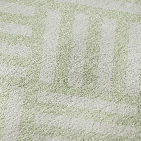 8' Mint Green And Ivory Geometric Washable Round Rug With UV Protection Photo 9