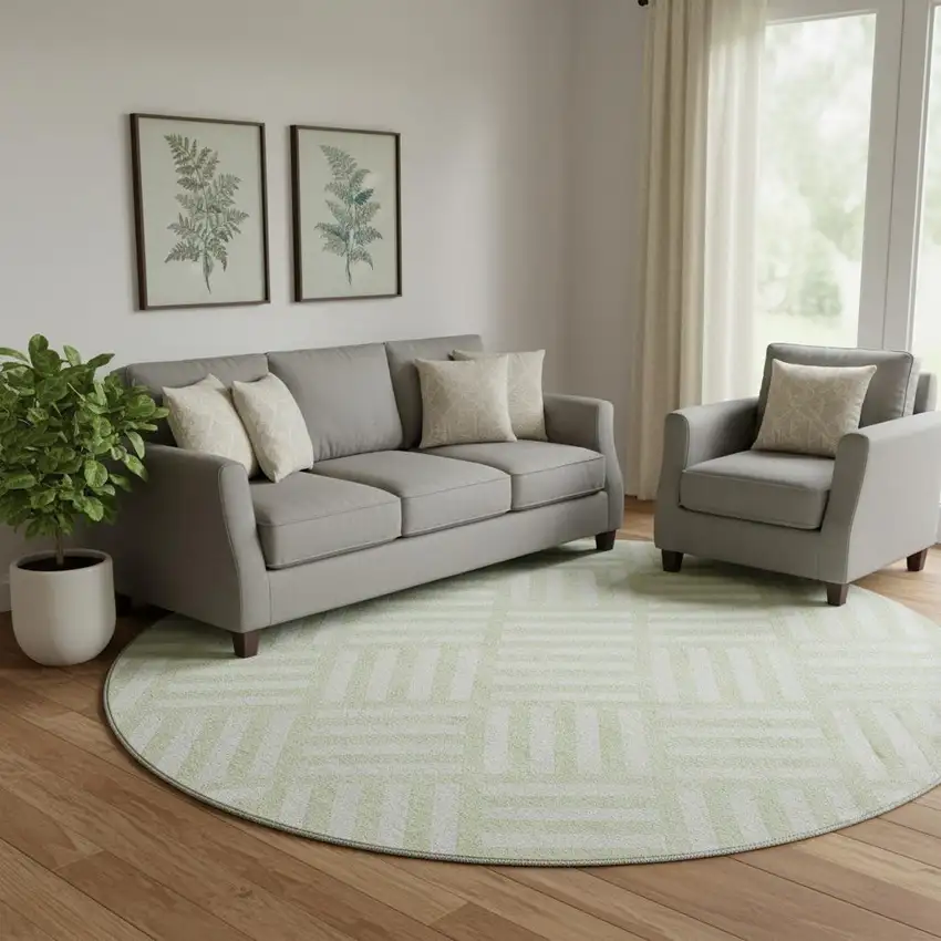 8' Mint Green And Ivory Geometric Washable Round Rug With UV Protection Photo 1