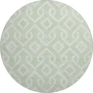 Photo of 8' Mint Green And Ivory Geometric Washable Round Rug With UV Protection