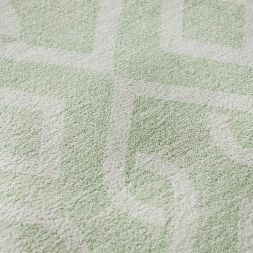 8' Mint Green And Ivory Geometric Washable Round Rug With UV Protection Photo 9