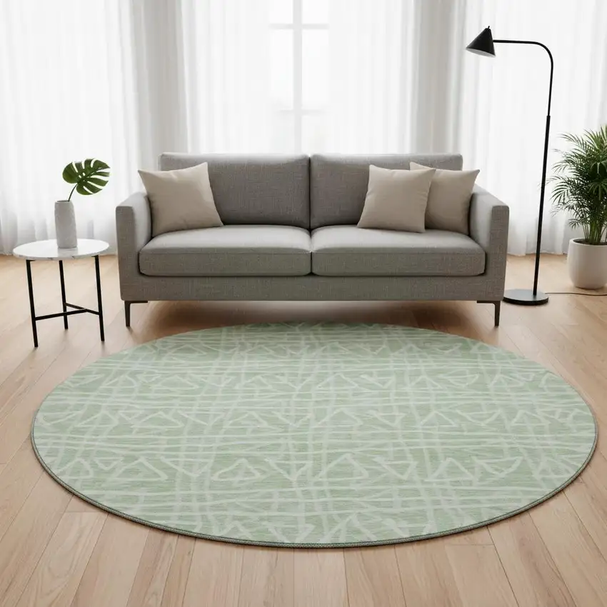 8' Mint Green And Ivory Geometric Washable Round Rug With UV Protection Photo 2