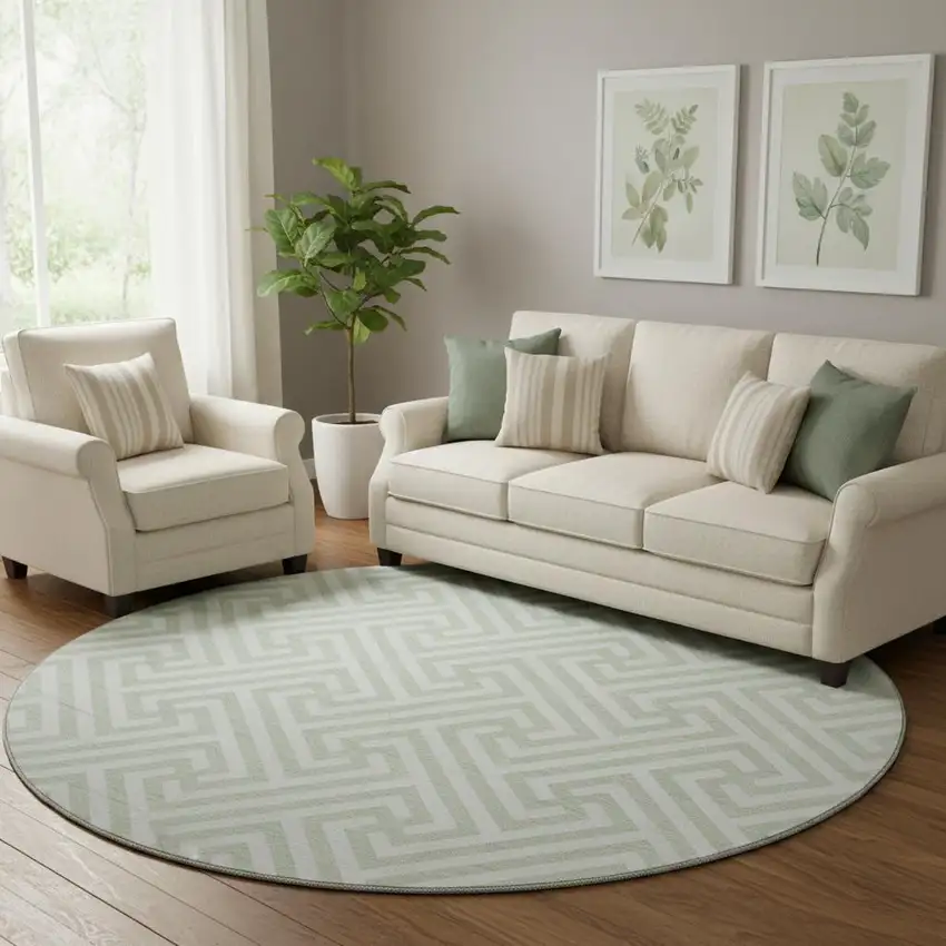 8' Mint Green And Ivory Geometric Washable Round Rug With UV Protection Photo 1