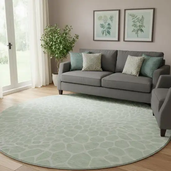 8' Mint Green And Ivory Geometric Washable Round Rug With UV Protection Photo 1