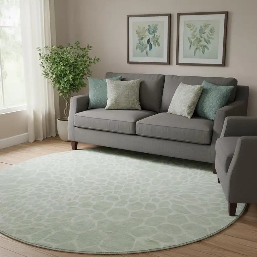 8' Mint Green And Ivory Geometric Washable Round Rug With UV Protection Photo 1