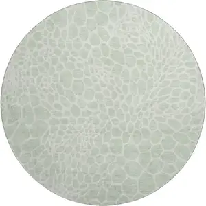 Photo of 8' Mint Green And Ivory Geometric Washable Round Rug With UV Protection