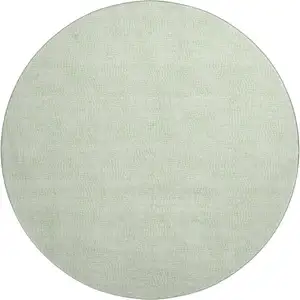 Photo of 8' Mint Green And Ivory Geometric Washable Round Rug With UV Protection