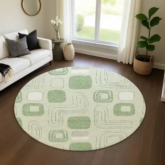8' Mint Green And Ivory Geometric Washable Round Rug With UV Protection Photo 4