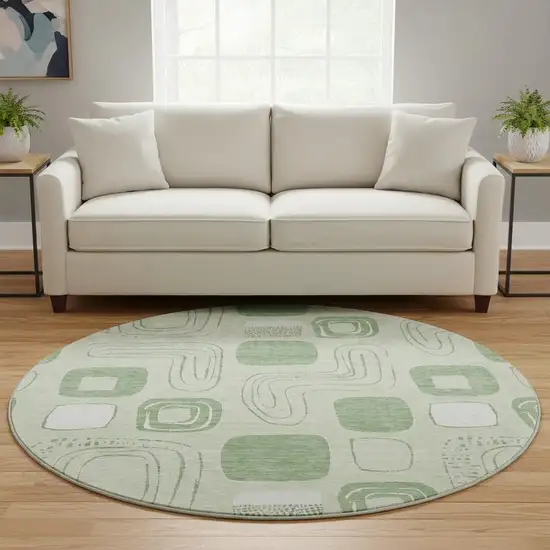 8' Mint Green And Ivory Geometric Washable Round Rug With UV Protection Photo 2