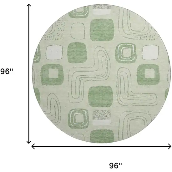 8' Mint Green And Ivory Geometric Washable Round Rug With UV Protection Photo 9