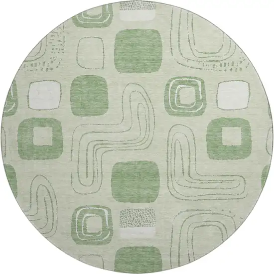 8' Mint Green And Ivory Geometric Washable Round Rug With UV Protection Photo 1