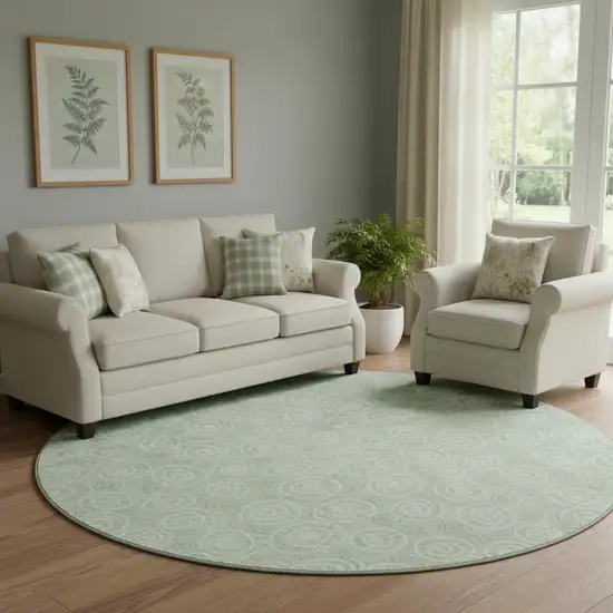 8' Mint Green And Ivory Polka Dot Washable Round Rug With UV Protection Photo 1