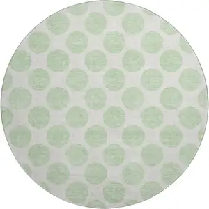 Photo of 8' Mint Green And Ivory Polka Dot Washable Round Rug With UV Protection