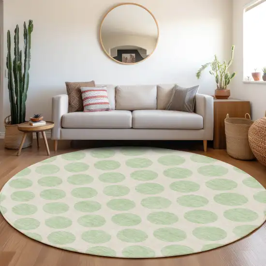 8' Mint Green And Ivory Polka Dot Washable Round Rug With UV Protection Photo 5