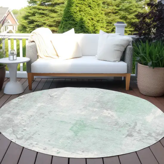 8' Mint Green And Ivory Round Abstract Washable Indoor Outdoor Area Rug Photo 5