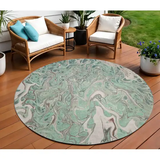 8' Mint Green And Ivory Round Abstract Washable Indoor Outdoor Area Rug Photo 1